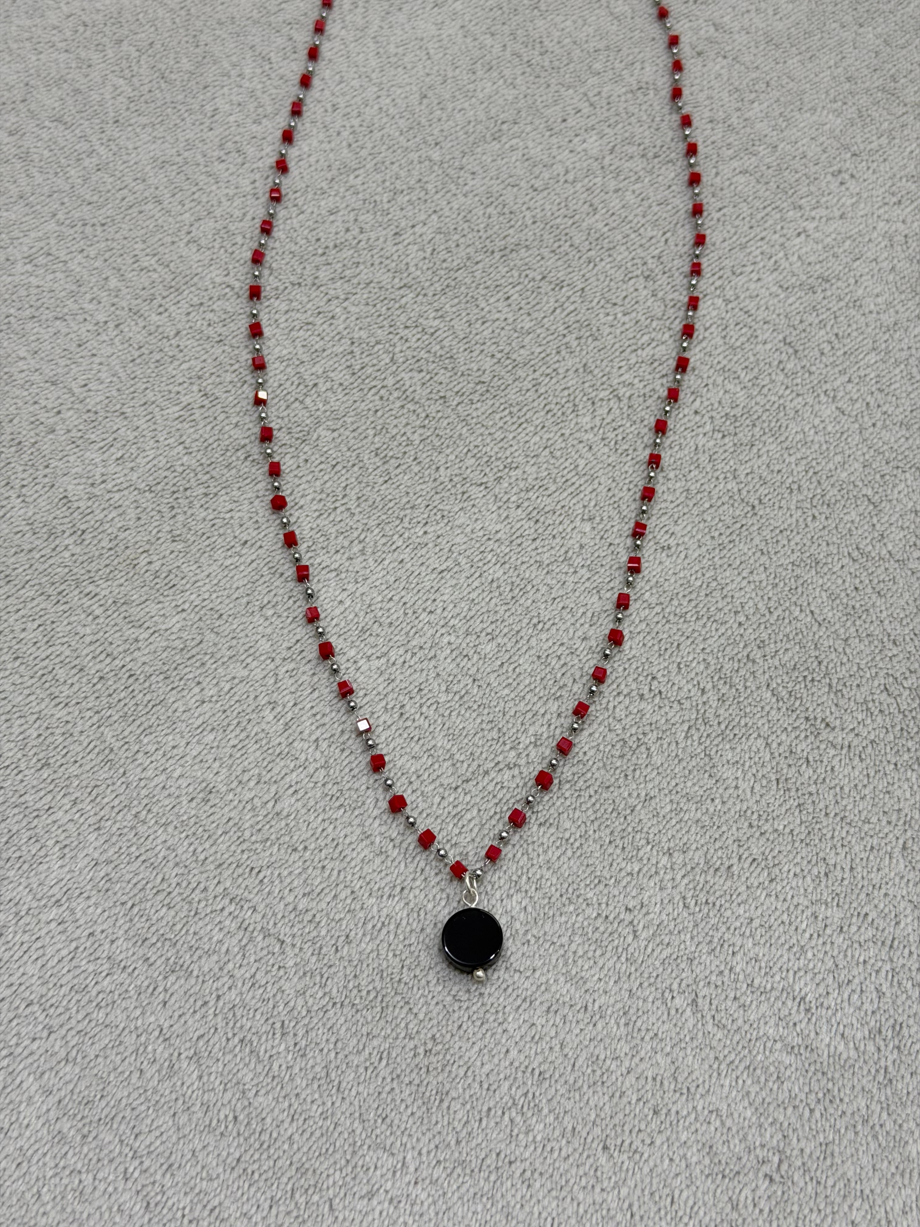 Stainless steel necklace with red beads