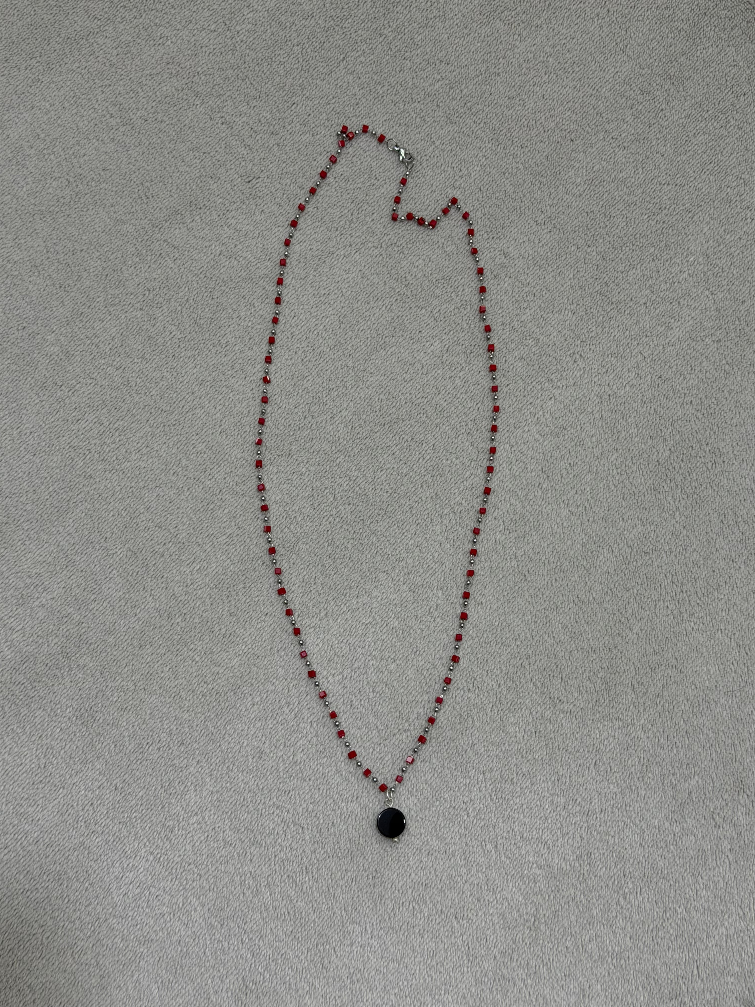 Stainless steel necklace with red beads